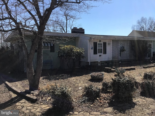 view of front of property with a chimney