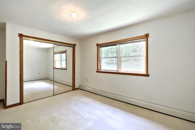 60 Fernwood Ln, Fairfield, PA 17320 - unfurnished bedroom with a baseboard heating unit, a closet, carpet, and baseboards