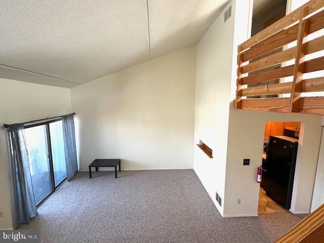 808 Stratford Dr Unit 32, State College, PA 16801 - interior space with carpet floors, visible vents, and a textured ceiling