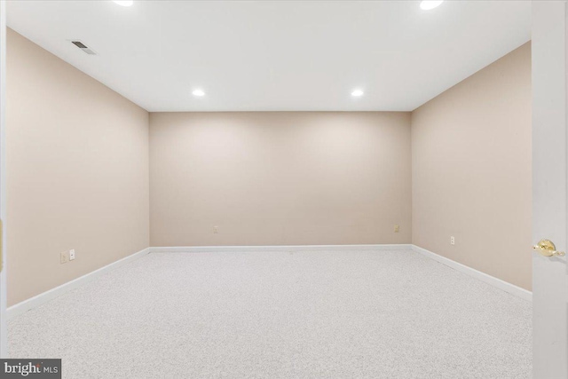 unfurnished room featuring baseboards, carpet, visible vents, and recessed lighting