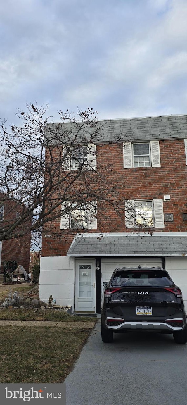 multi unit property featuring brick siding