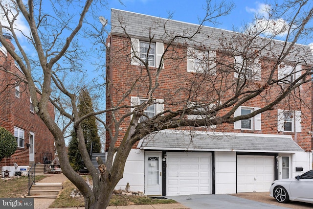 view of property with brick siding