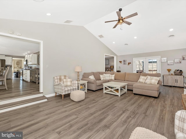 living area with french doors, recessed lighting, visible vents, ceiling fan, and wood finished floors