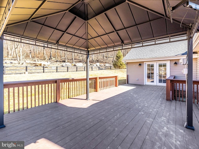 deck featuring french doors and a gazebo