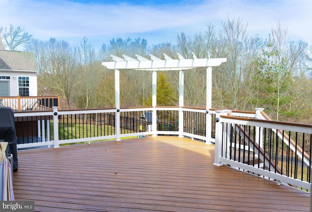 wooden terrace with a pergola