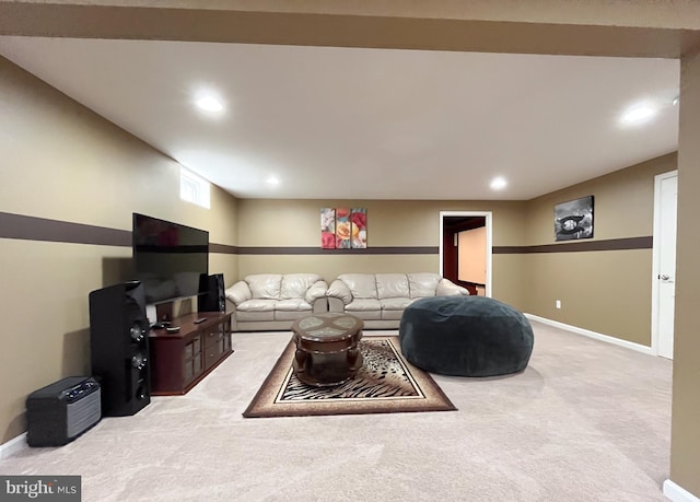 living area with carpet, baseboards, and recessed lighting