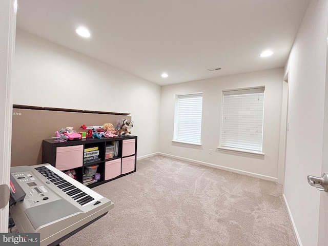 playroom with recessed lighting, light carpet, visible vents, and baseboards