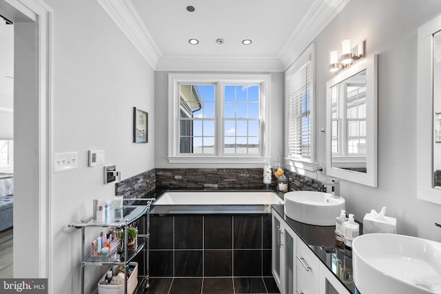 full bath with a bathtub, crown molding, recessed lighting, vanity, and tile patterned floors