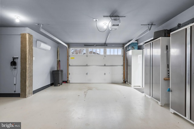 garage featuring a wall unit AC and a garage door opener