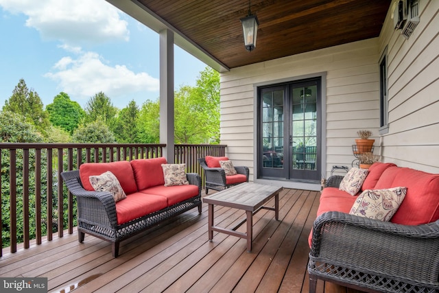 deck featuring an outdoor hangout area and french doors