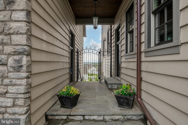 view of property exterior featuring a gate