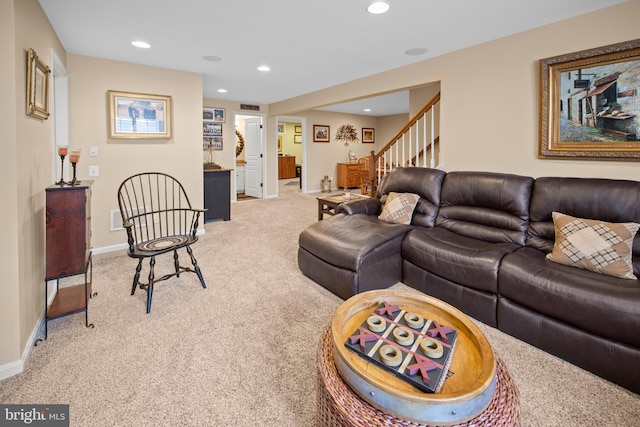 living area with light carpet, stairs, baseboards, and recessed lighting