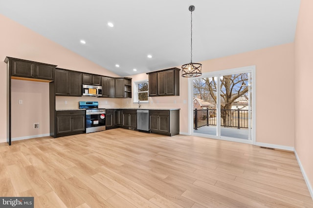 kitchen with light wood-style flooring, appliances with stainless steel finishes, light countertops, dark brown cabinets, and open shelves