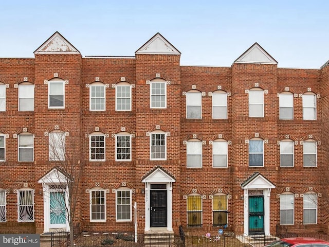 view of front of property with brick siding