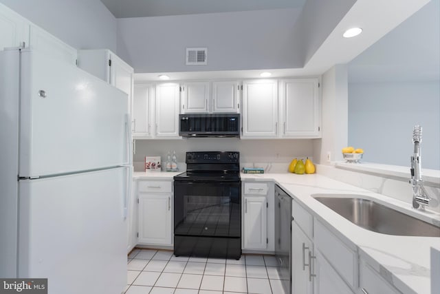 7014 Ellingham Cir Unit F, Alexandria, VA 22315 - kitchen with freestanding refrigerator, electric range, a sink, black microwave, and dishwasher