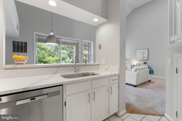 7014 Ellingham Cir Unit F, Alexandria, VA 22315 - kitchen with stainless steel dishwasher, a sink, light carpet, light stone counters, and recessed lighting