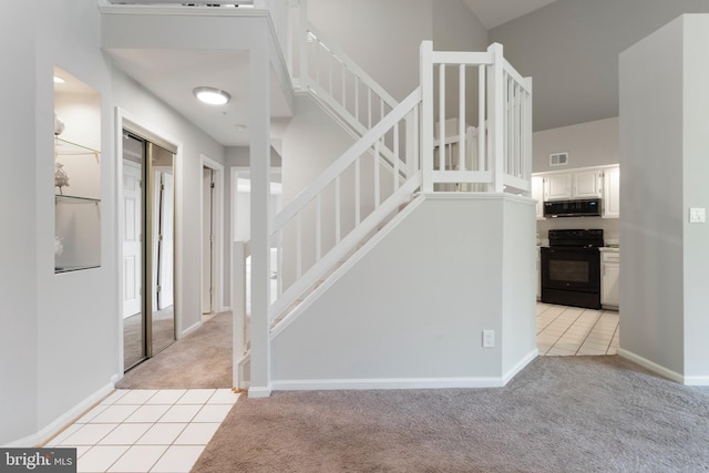 7014 Ellingham Cir Unit F, Alexandria, VA 22315 - stairs featuring carpet floors and baseboards