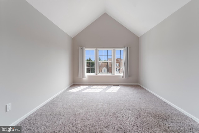 7014 Ellingham Cir Unit F, Alexandria, VA 22315 - spare room with carpet, vaulted ceiling, and baseboards