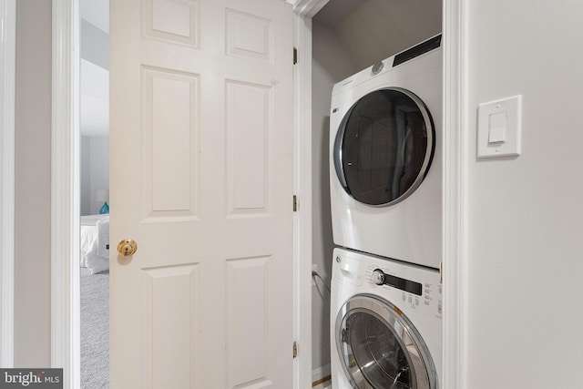 7014 Ellingham Cir Unit F, Alexandria, VA 22315 - laundry room featuring stacked washer / drying machine