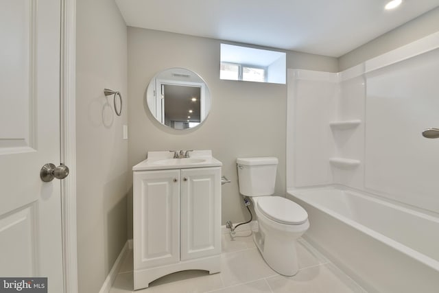 bathroom featuring shower / washtub combination, toilet, vanity, baseboards, and tile patterned floors