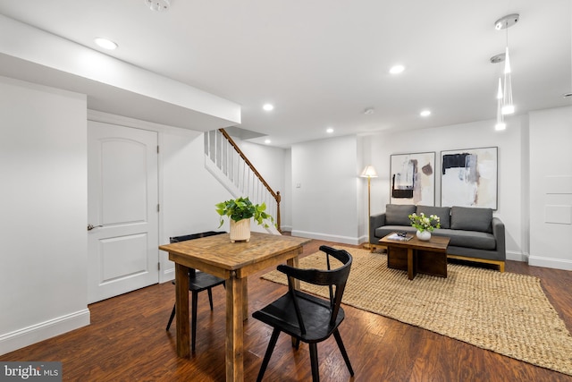 dining space with stairs, recessed lighting, wood finished floors, and baseboards