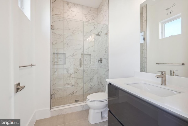 full bathroom with toilet, a marble finish shower, and vanity