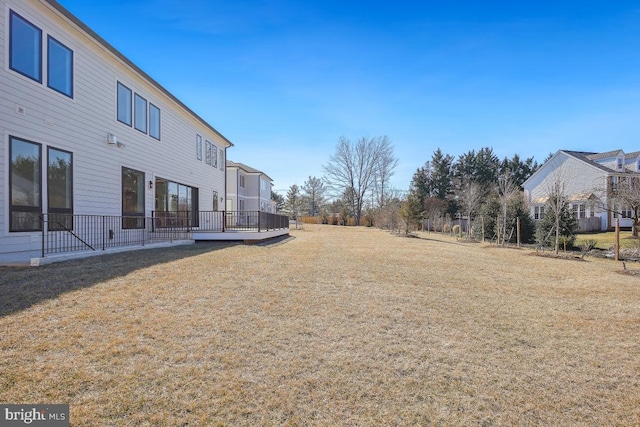 view of yard with a wooden deck