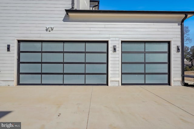 garage featuring driveway