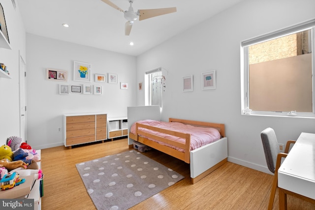 bedroom with ceiling fan, baseboards, wood finished floors, and recessed lighting