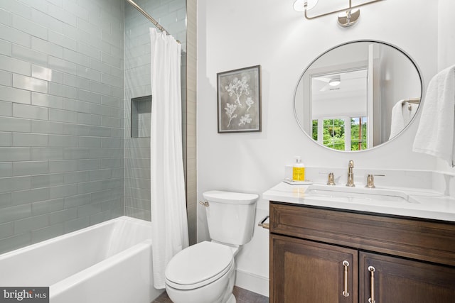 bathroom featuring vanity, toilet, and shower / bathtub combination with curtain