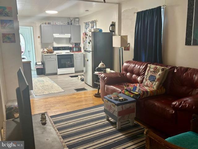 living area with light wood-style flooring