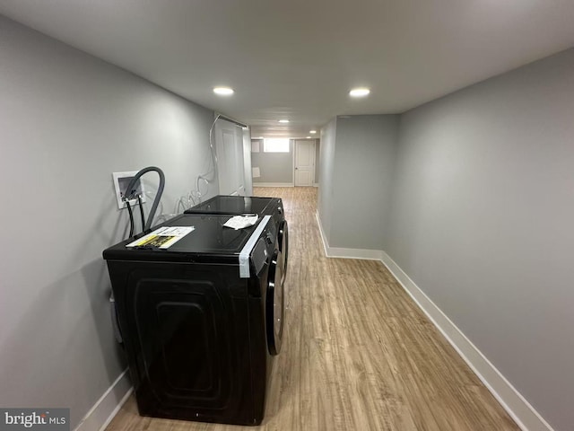 interior space with recessed lighting, light wood-style flooring, and baseboards