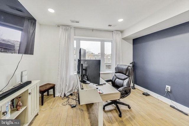 office area featuring recessed lighting, light wood-type flooring, visible vents, and baseboards