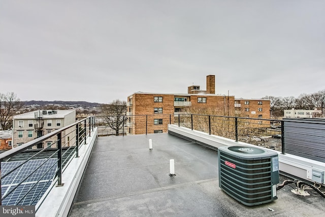 balcony featuring central air condition unit