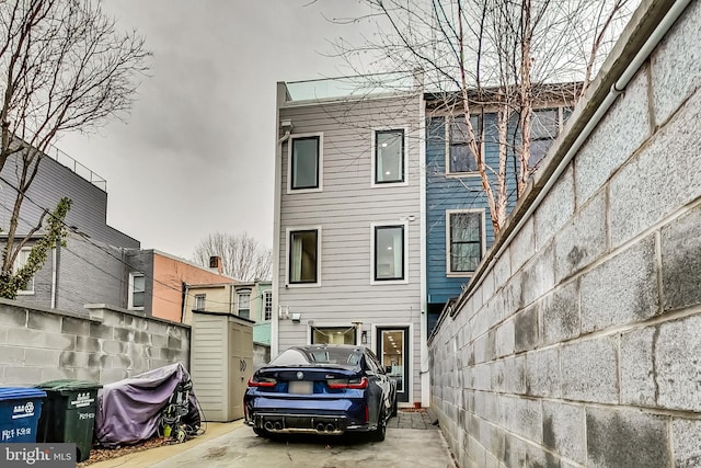view of front of house with fence