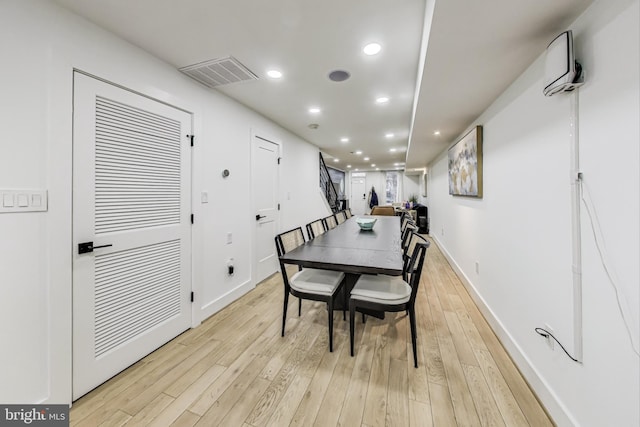 dining room with recessed lighting, visible vents, stairway, light wood-type flooring, and baseboards