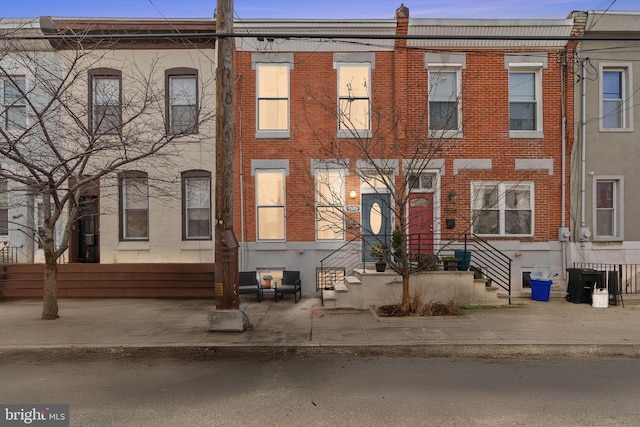 multi unit property featuring brick siding