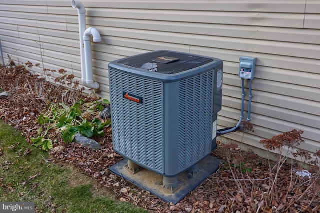 exterior details featuring cooling unit