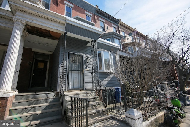 exterior space with brick siding