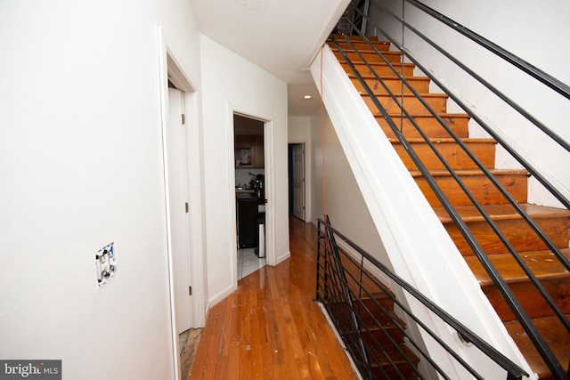 corridor with wood finished floors