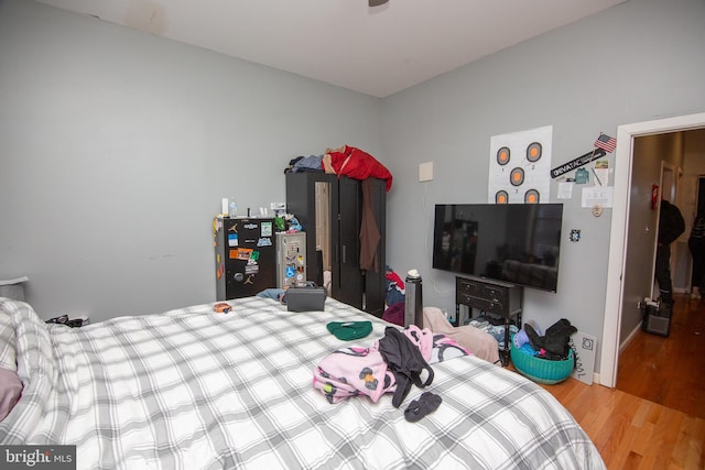 bedroom featuring wood finished floors