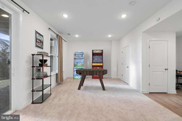 playroom with recessed lighting, light carpet, visible vents, and baseboards