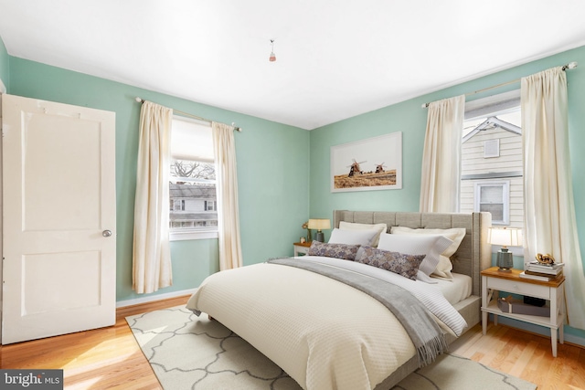 bedroom with wood finished floors