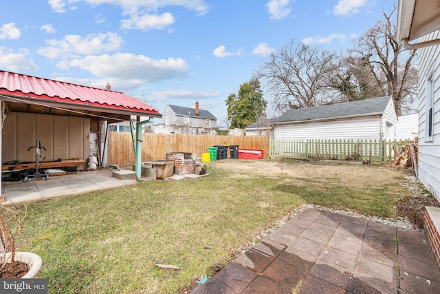 view of yard with a fenced backyard and a patio