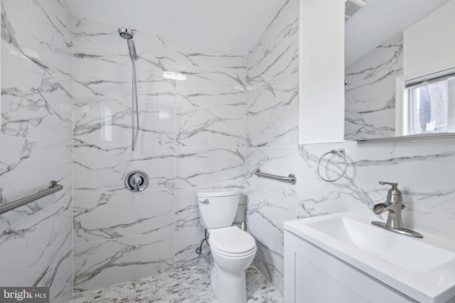 bathroom with stone wall, toilet, visible vents, vanity, and a marble finish shower