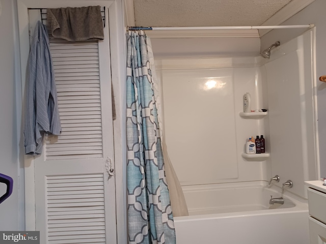 bathroom featuring shower / bath combination with curtain and vanity