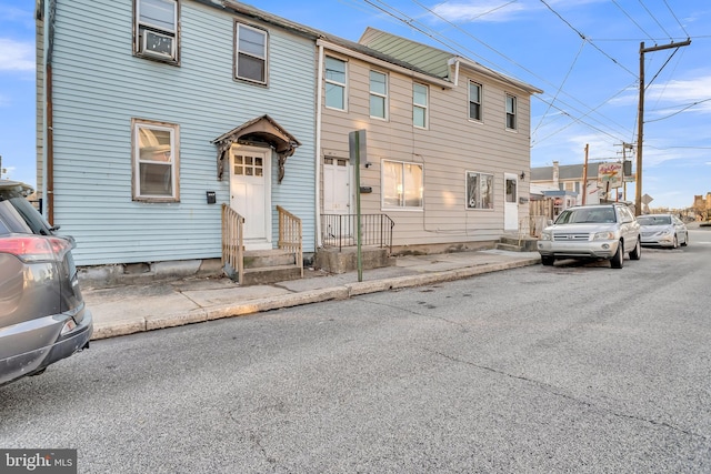 townhome / multi-family property featuring entry steps