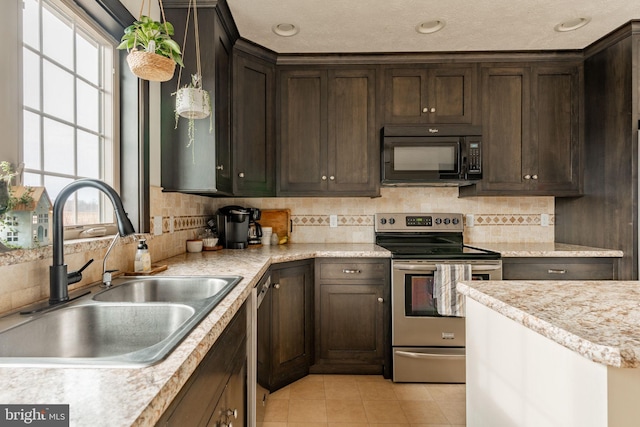 kitchen with stainless steel electric range, black microwave, dark brown cabinets, and a sink