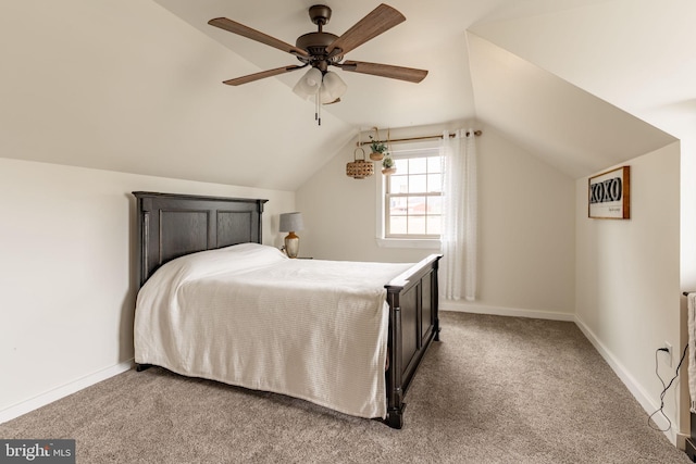 bedroom with light carpet, ceiling fan, baseboards, and lofted ceiling