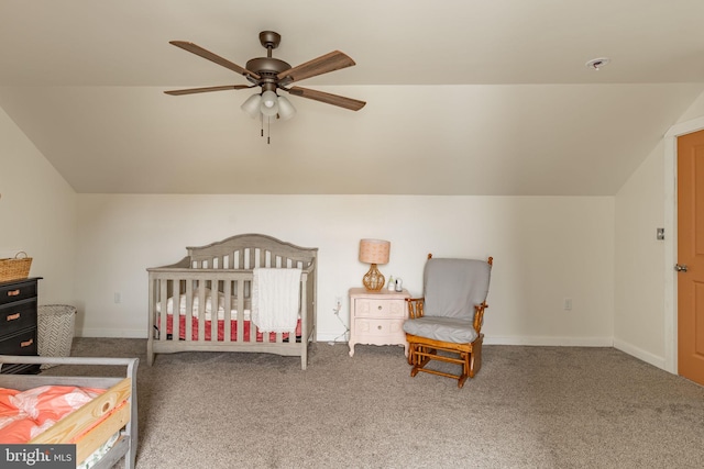 carpeted bedroom featuring lofted ceiling, a ceiling fan, and baseboards